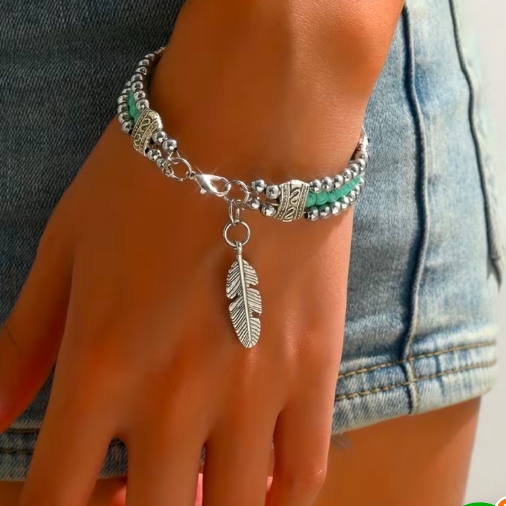 Woman’s Double Row Turquoise Bead Vintage Carved Feather Bracelet.